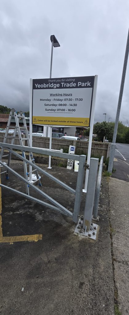 Yeobridge Trade Park opening hours signage mounted near the site entrance