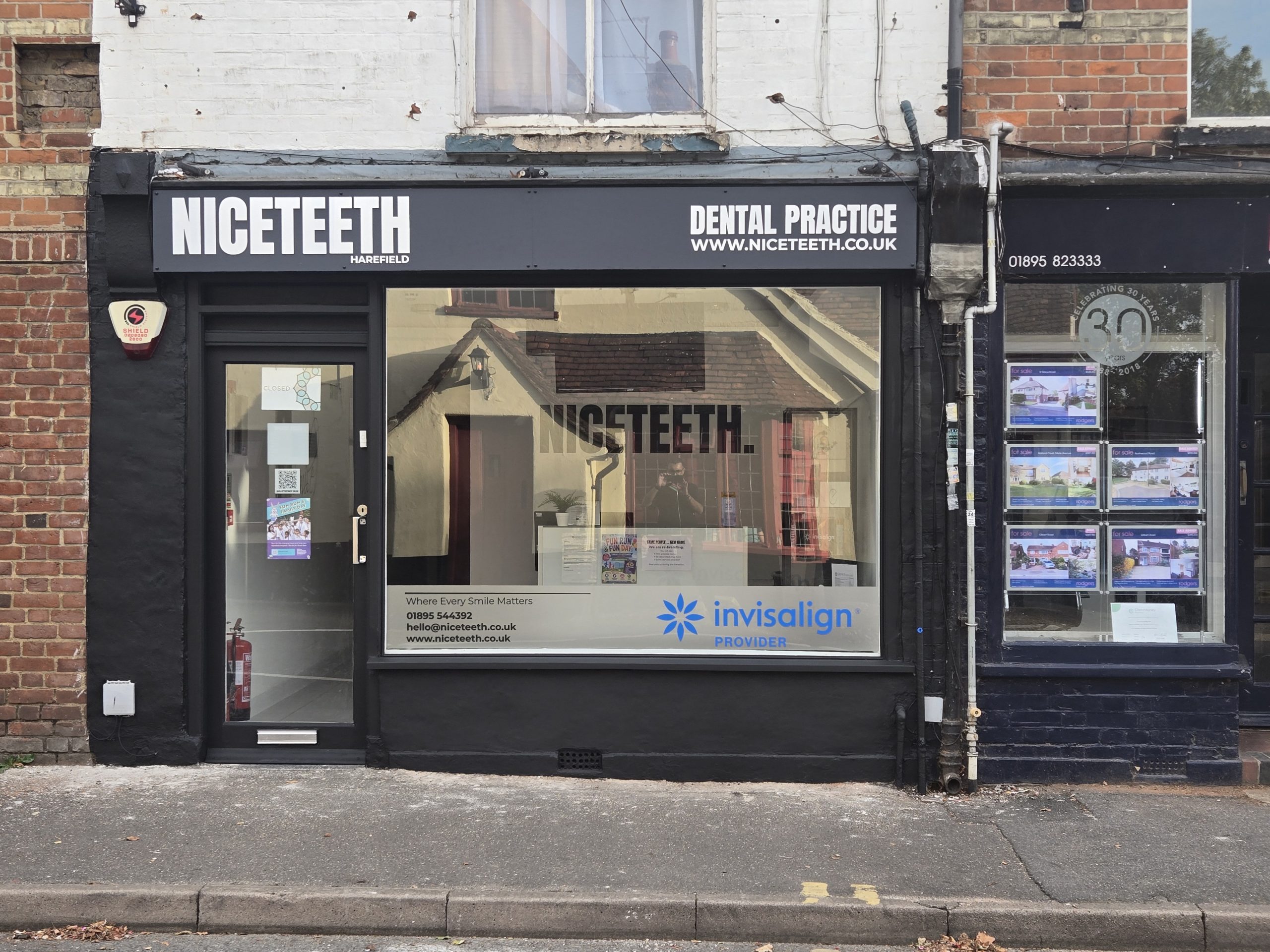 Front elevation of Niceteeth in Harefield showing the new fascia sign and window graphics.